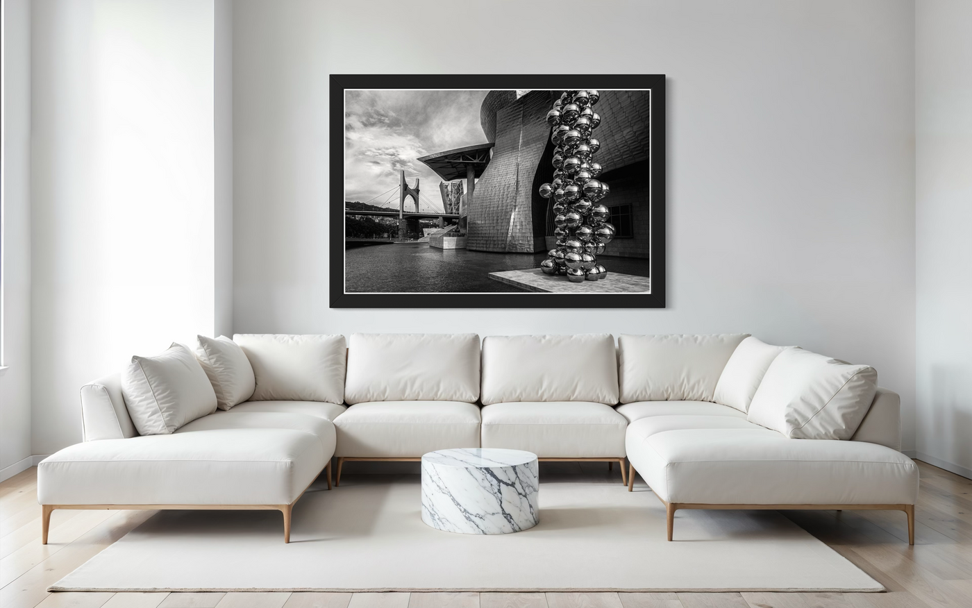 Black and white image of the outside of the Guggenheim Museum Bilbao.